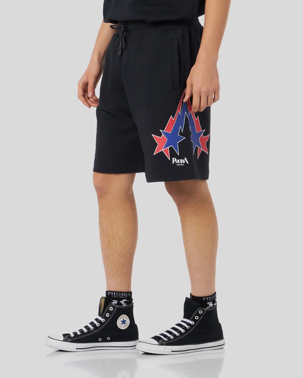 Pantaloncino Phobia neri con grafica Starry Lightning rossa e blu