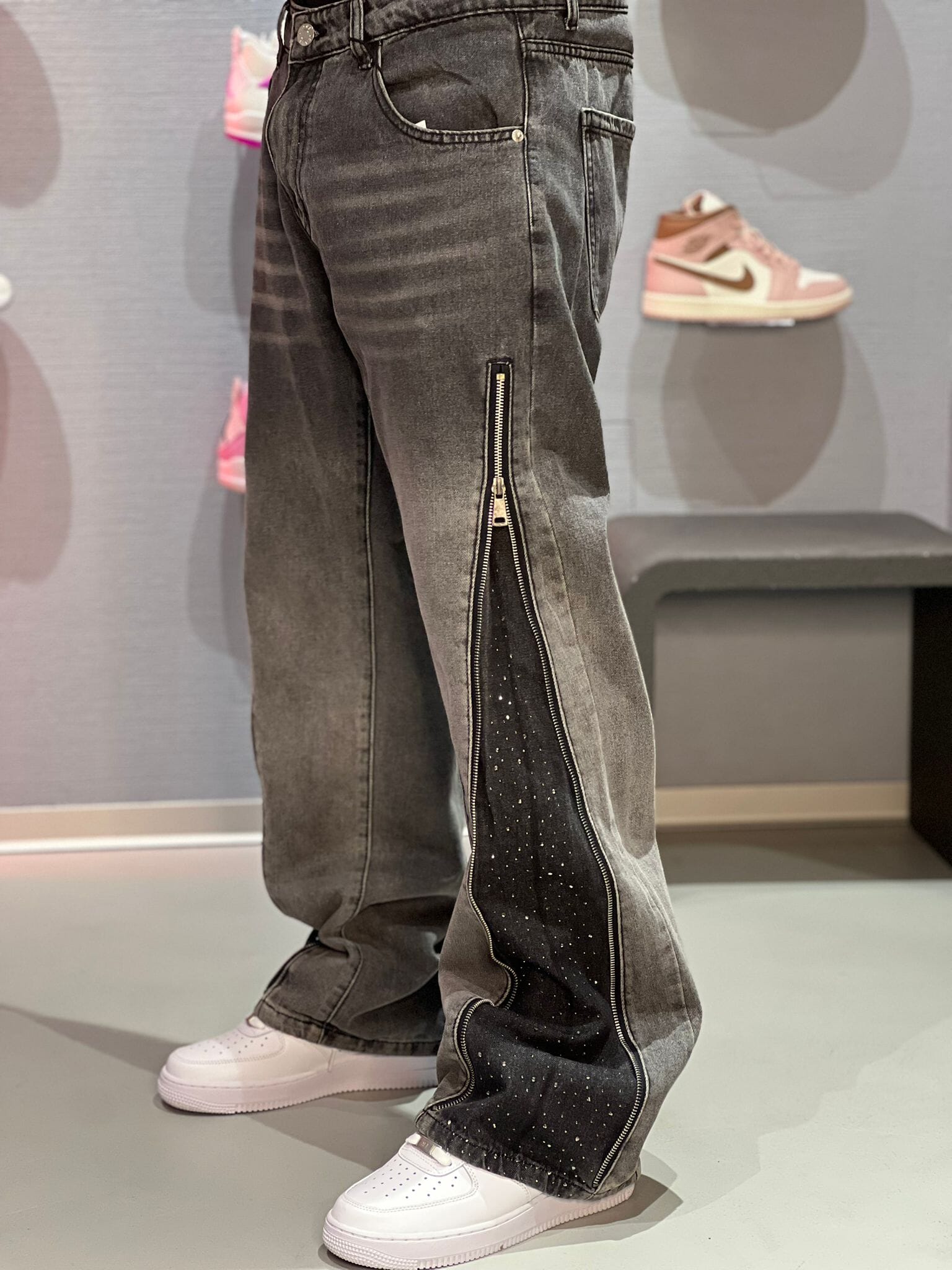 Jeans Flare con zip strass