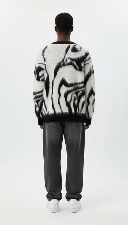 Maglione bianco con sfumature nere in lana