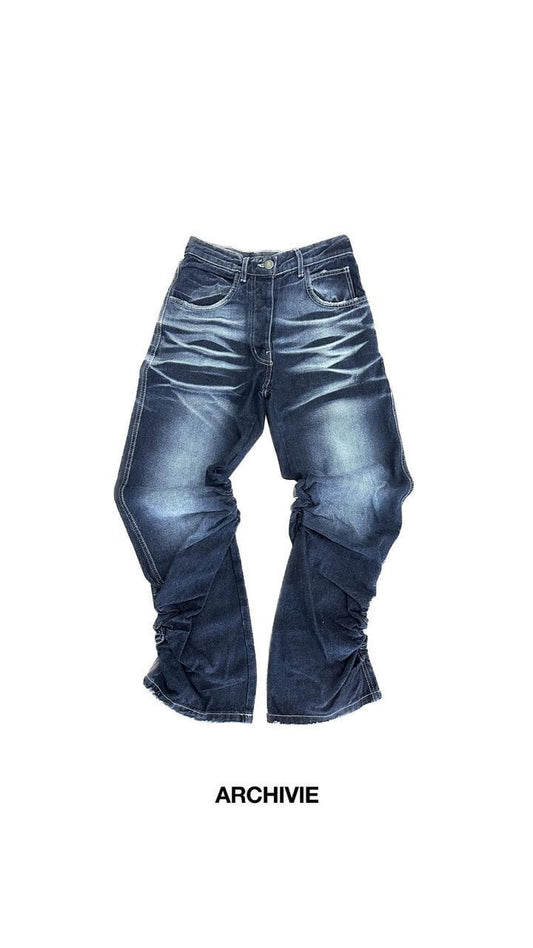 Jeans con arricciature laterali lavaggio blu