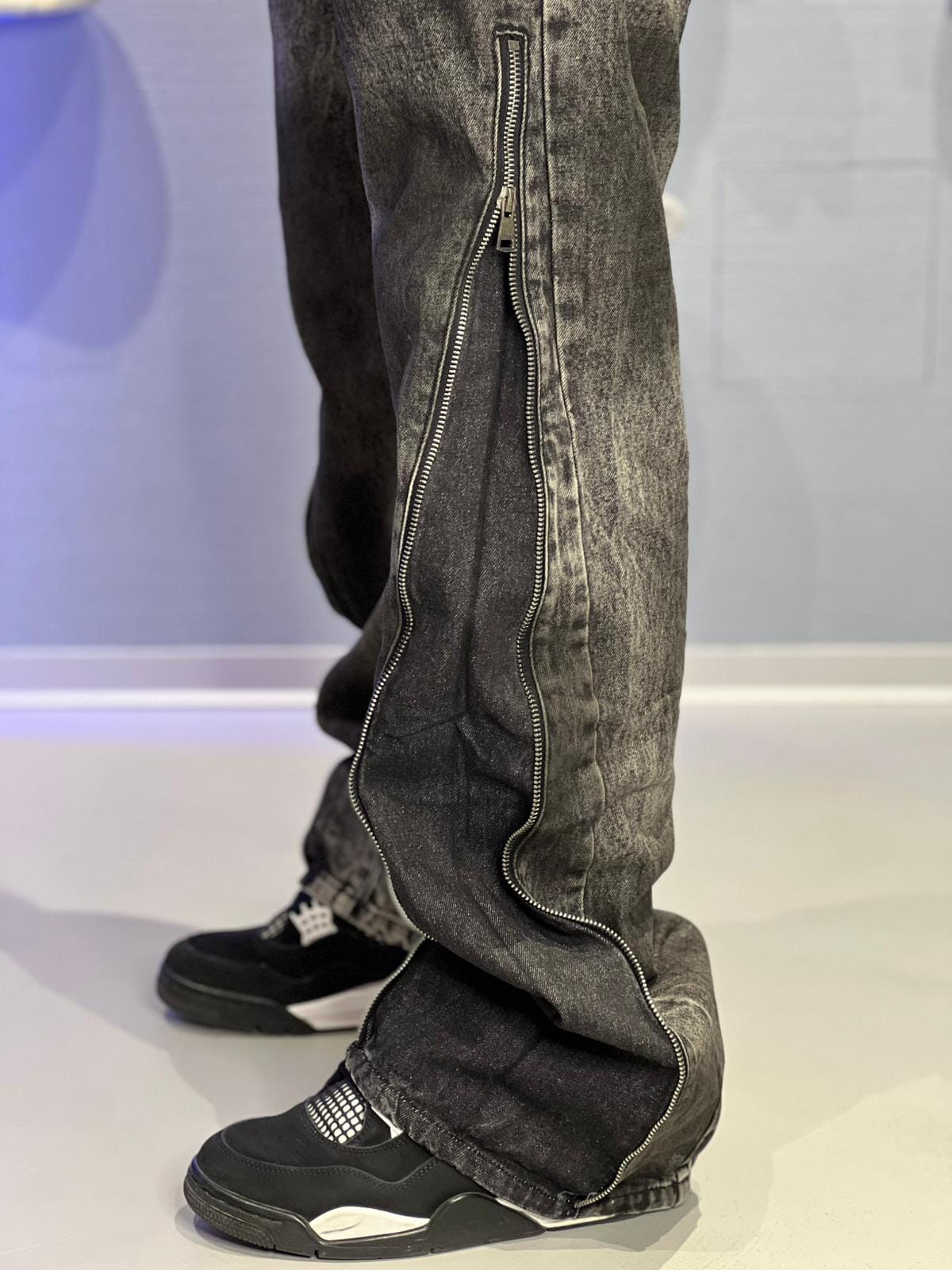 Jeans Flare con zip Nero