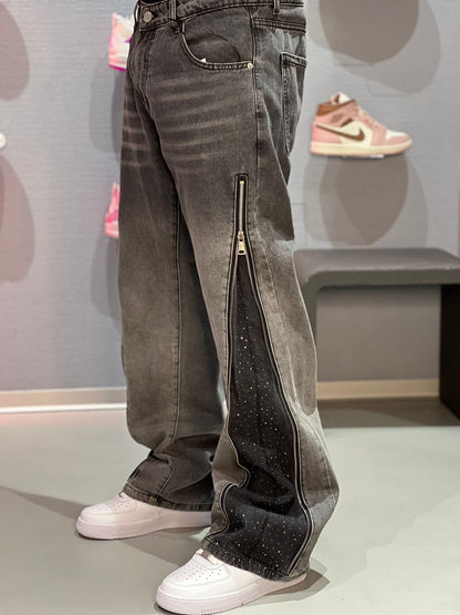 Jeans Flare con zip strass