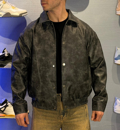 Giubbotto effetto marmorizzato grigio