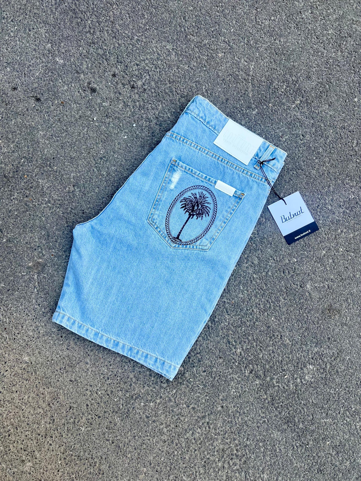 Pantaloncino di jeans  Butnot stampa palme