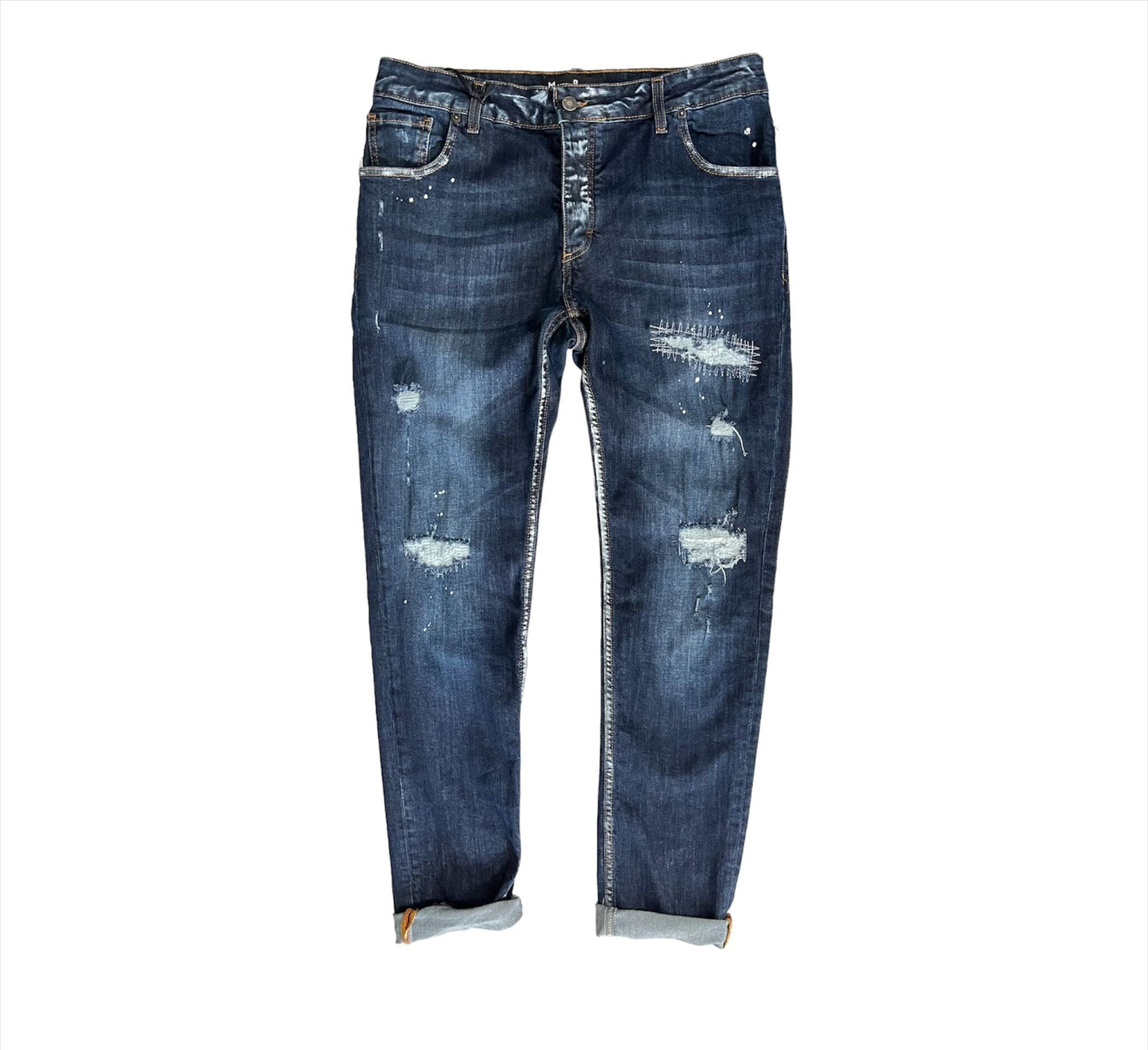jeans strappato con gocce di vernice
